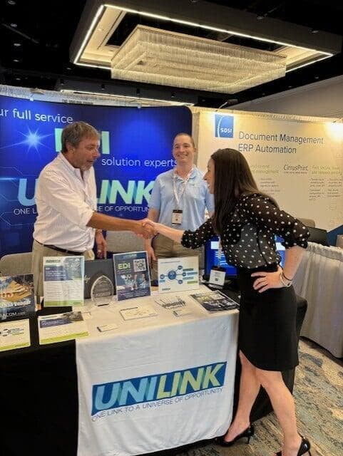 Partner from UnForm visiting the UniLink Team at the SyteLine User Network meeting in 2024